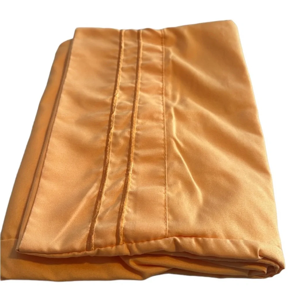 Pair of microfiber pillowcases in tangerine. EUC.